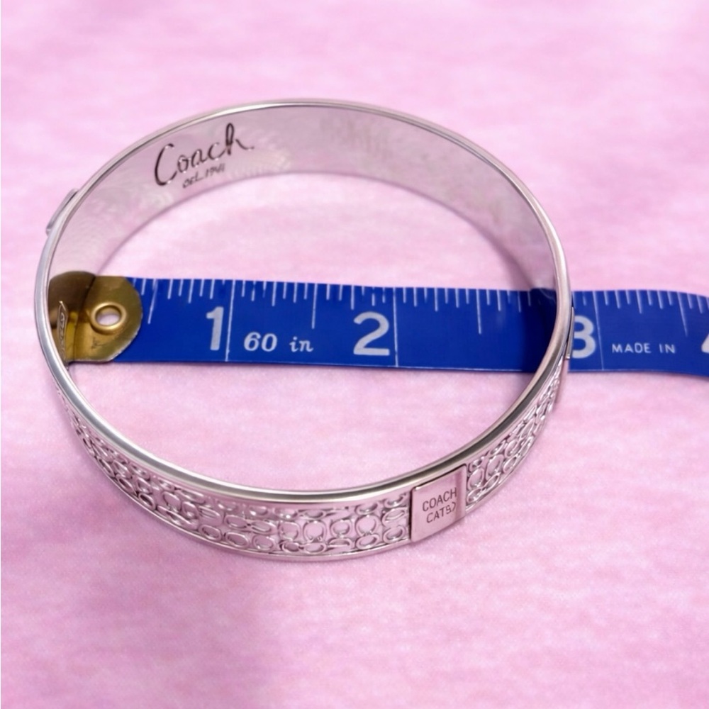 Quiet Luxury Silver Tone Cuff Bracelet with Intricate “C” Design - Picture 4 of 6